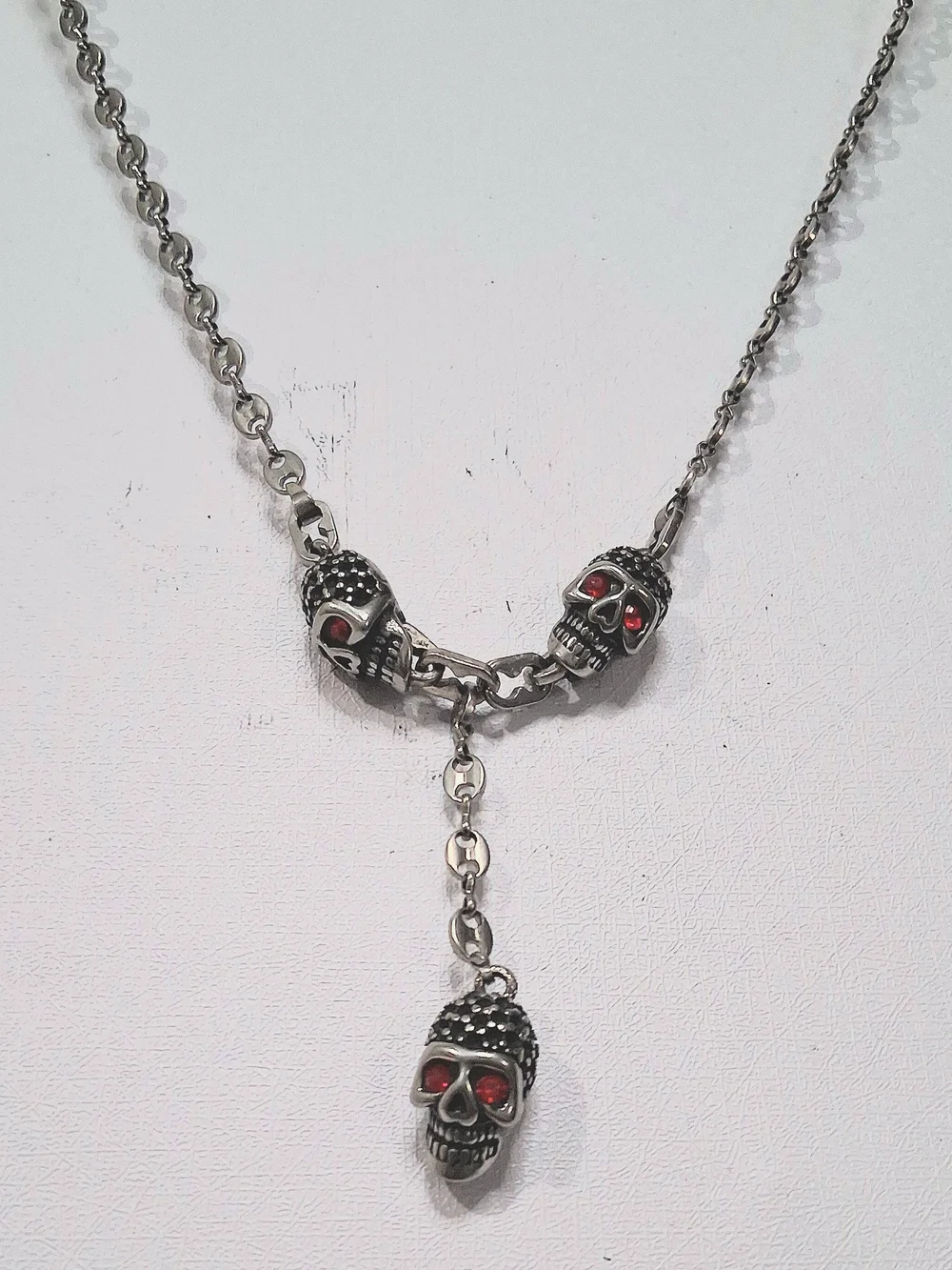 Surgical Steel Skull Drop Necklace with Red Eye Accents